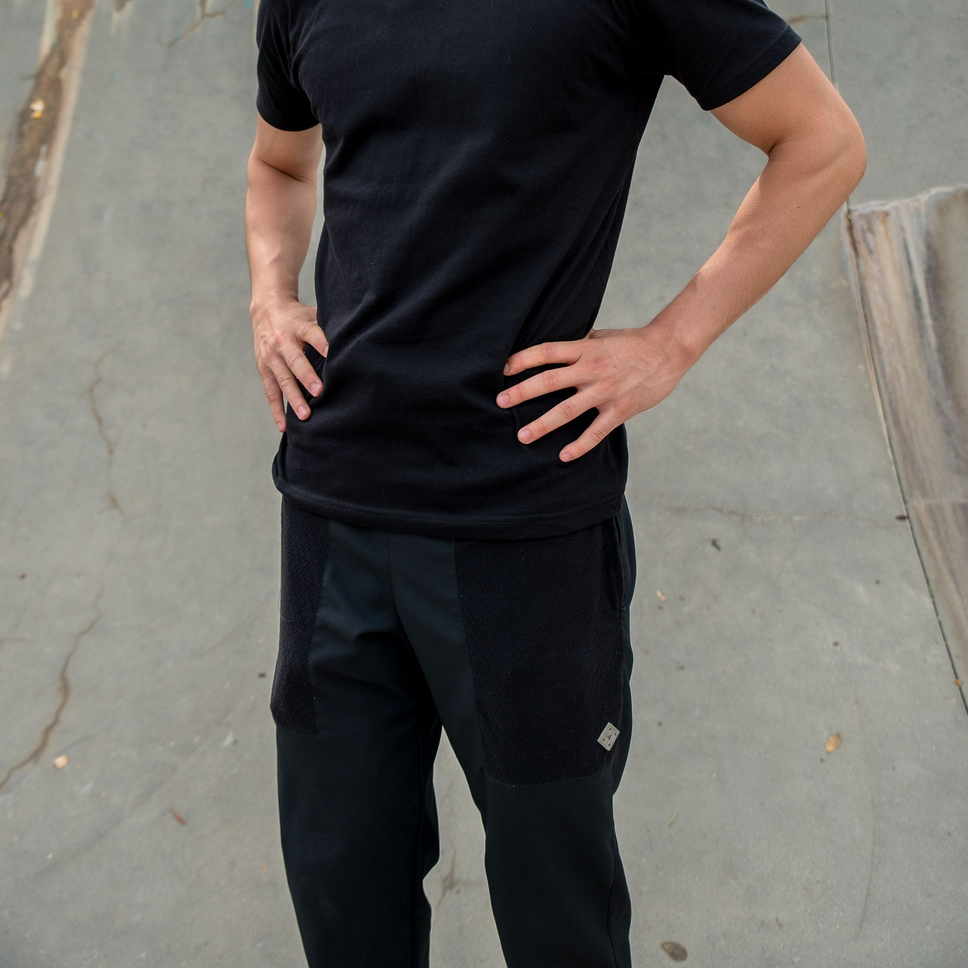 Hearthstone POINT3 DRYV® Black Joggers Model Standing - Front View